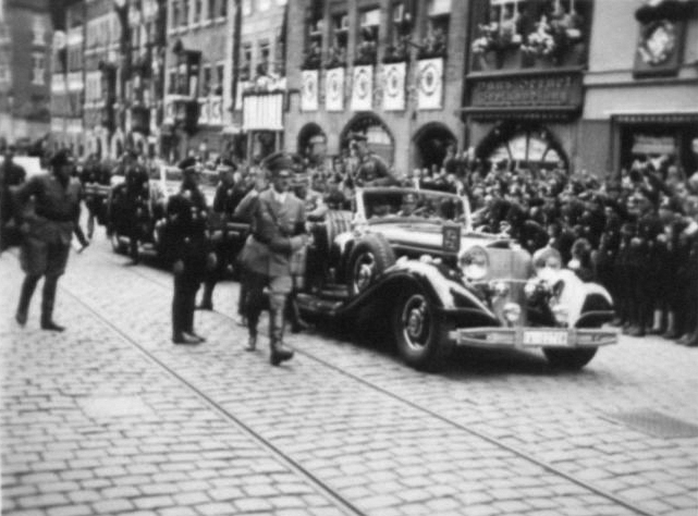Adolf Hitler arrives at Nuremberg's town hall to open the 8th Reichsparteitag